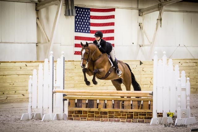 Leanna Lazzari and her horse, Cavallino, competing at the World Equestrian Center in Wilmington, OH, in 2016.  Photo by Third Shutter from the Sun Photography