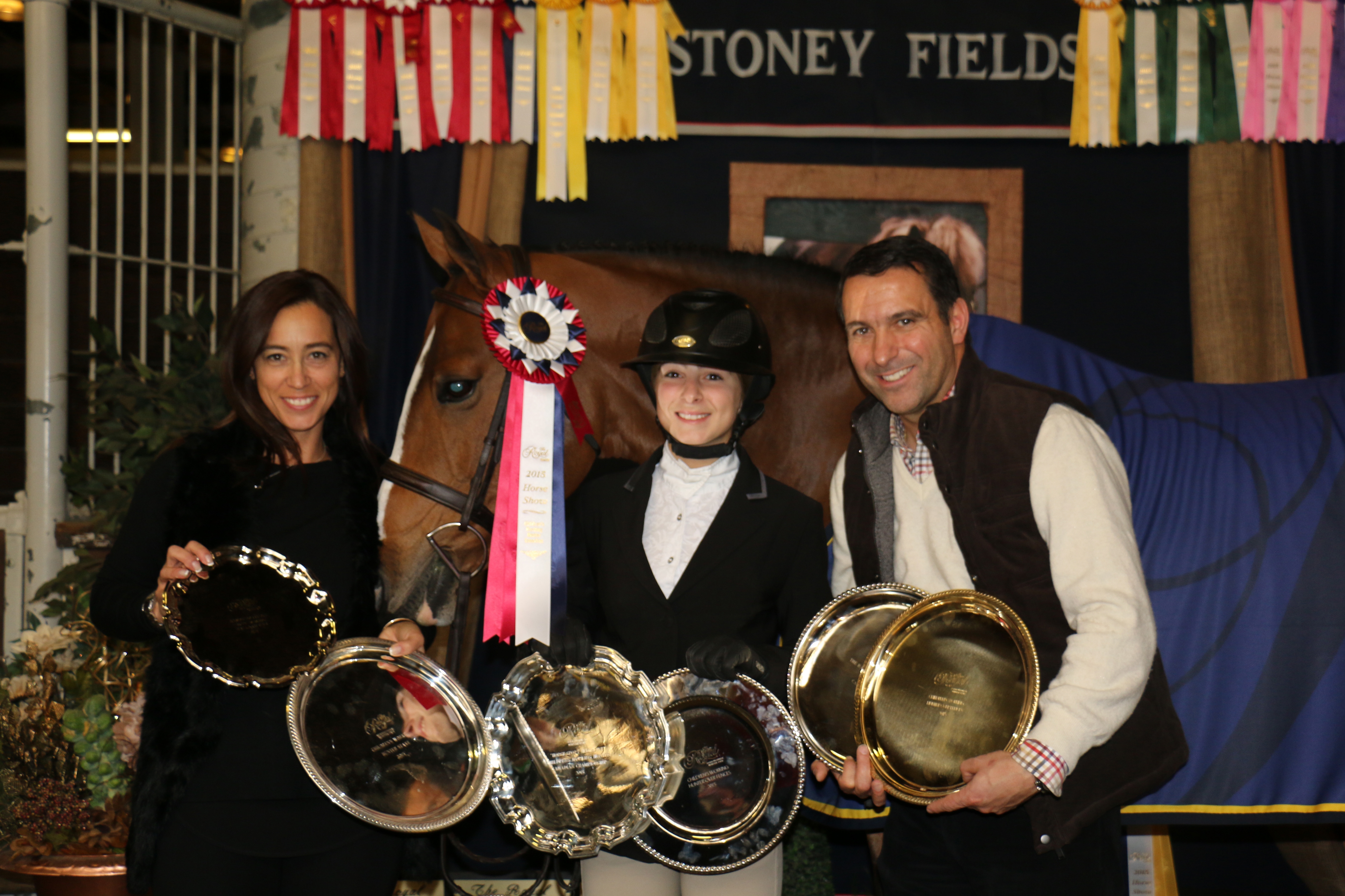 Leanna Lazzari (center) and Socialite with her parents, Dorothy and Paul, at the Royal Horse Show.  Photo Courtesy of the Lazzari Family